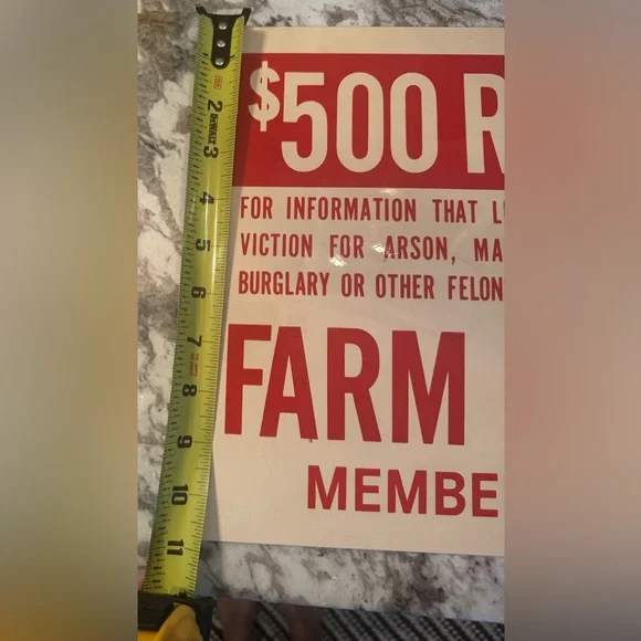 The sign in the image is a Farm Bureau reward sign. Scioto Sign Co. Kenton, Ohio - Picture 7 of 11